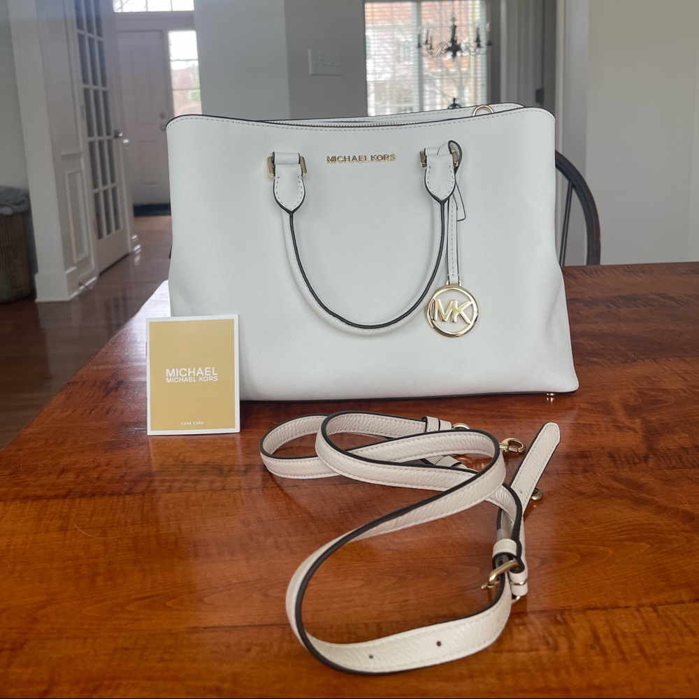 Used once! Michael Kors purse. Color white with gold hardware